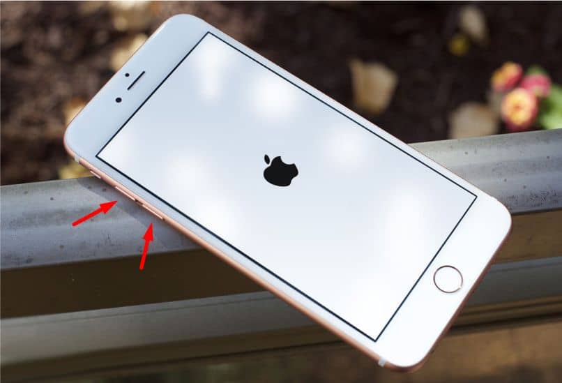 telefone celular iphone madeira maçã seta desfocar fundo